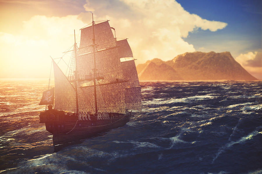 Pirate ship sailing towards lonely island at sunset Photograph by Matjaz Slanic