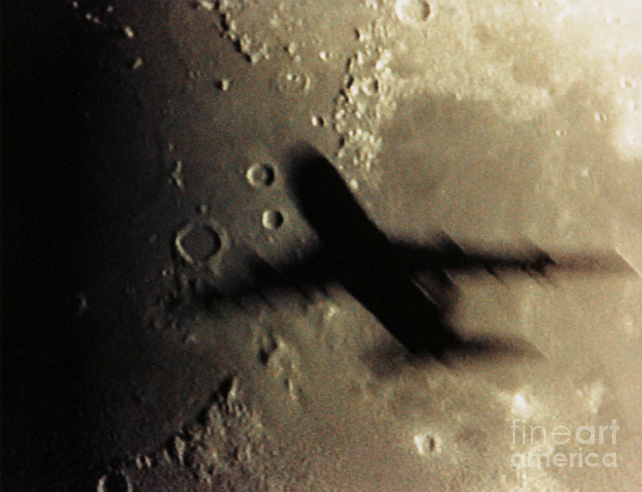 Plane Passing In Front Of The Moon Photograph by John Chumack
