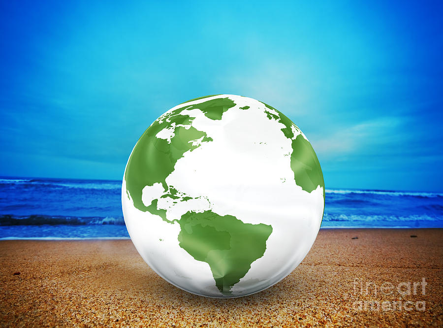 Planet earth model on the beach Photograph by Michal Bednarek