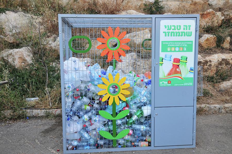 plastic bottle shaped recycling bin