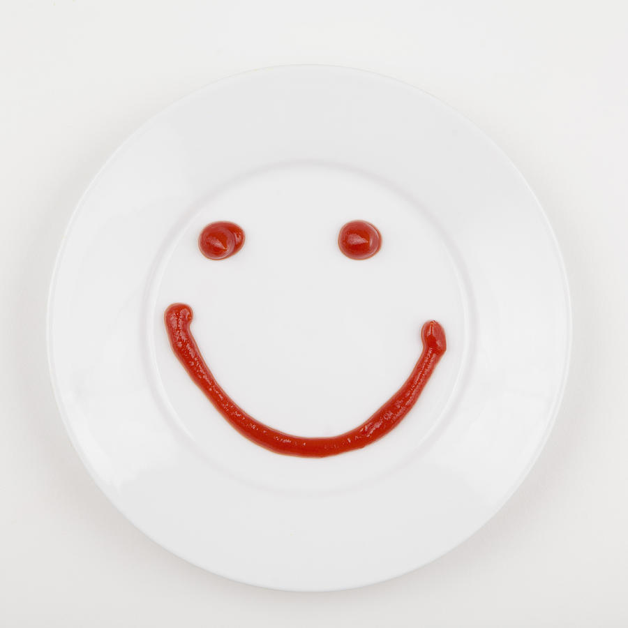 Plate with smiley face made of ketchup Photograph by Jessica Peterson