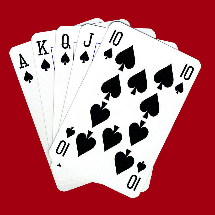 Playing cards showing royal flush, close-up Photograph by Kenna Love