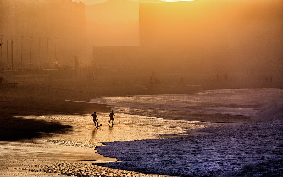 Playing Football On The Shore Photograph by Jois Domont (