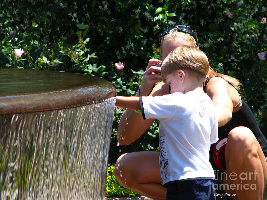 Water Fountain Photograph - Playing in Water by Greg Patzer