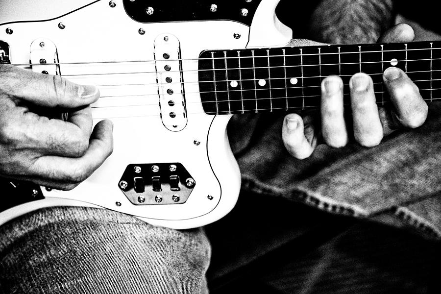 Playing The Six Strings Photograph by Karol Livote
