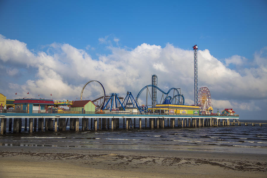 Pleasure Pier on a cloudy day Photograph by John McGraw