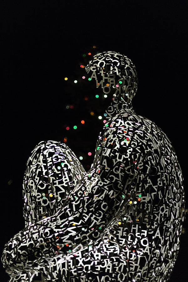 Plensa Sculpture and Christmans Light #2 Photograph by Wendy Chapman