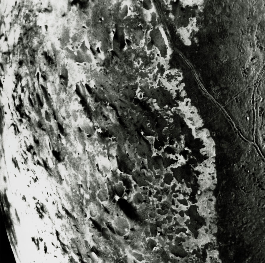 Plumes Of Dark Material On Surface Of Triton Photograph by Nasa/science Photo Library
