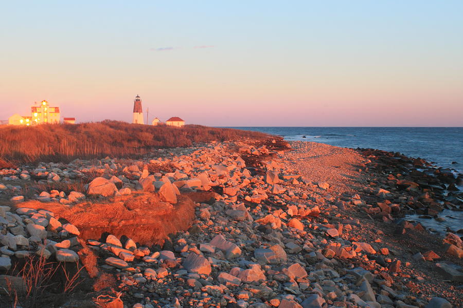 Point Judith Lighthouse and Rocky Beach in Evening Light Photograph by John Burk