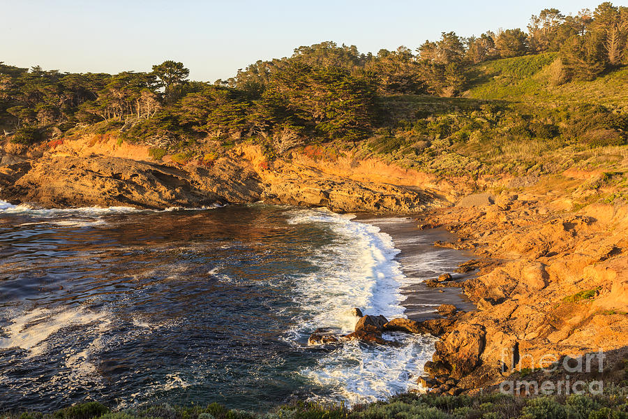 Point Lobos Headland Cove sunset Photograph by Ken Brown