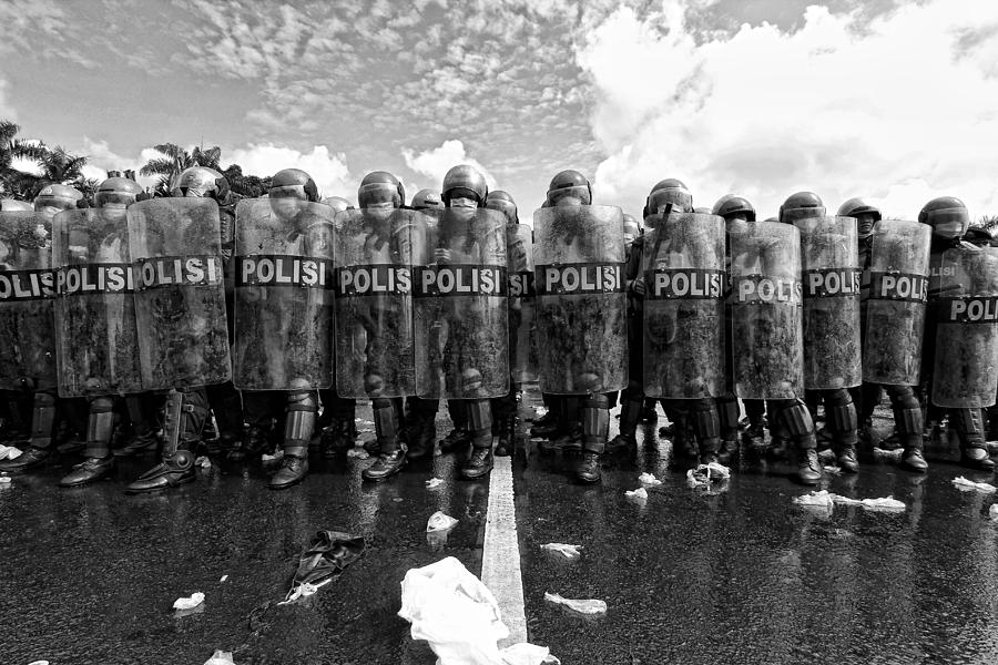 Black And White Photograph - Police Barricades by M Salim Bhayangkara Black And White Photograph - Police Barricades by M Salim Bhayangkara
