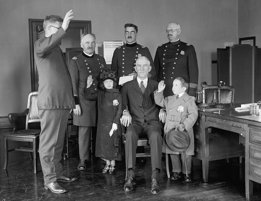 Police Department Swears In Singer Photograph by Science Source