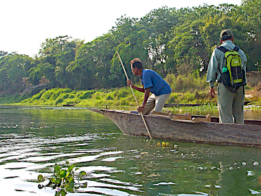 Poling a Dugout Canoe in the Rapti River in Chitwan National ParkNepal