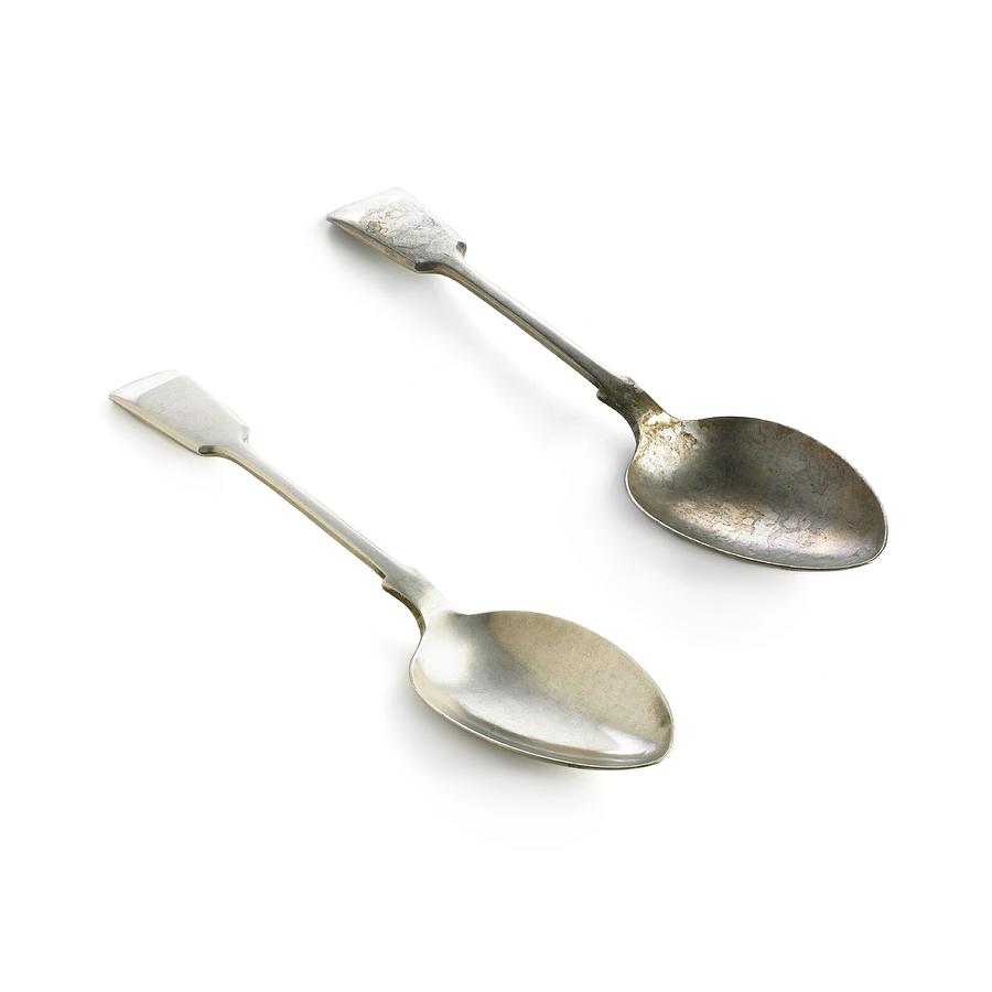 Spoon Still Life Photograph - Polished And Tarnished Silver Spoons by Science Photo Library