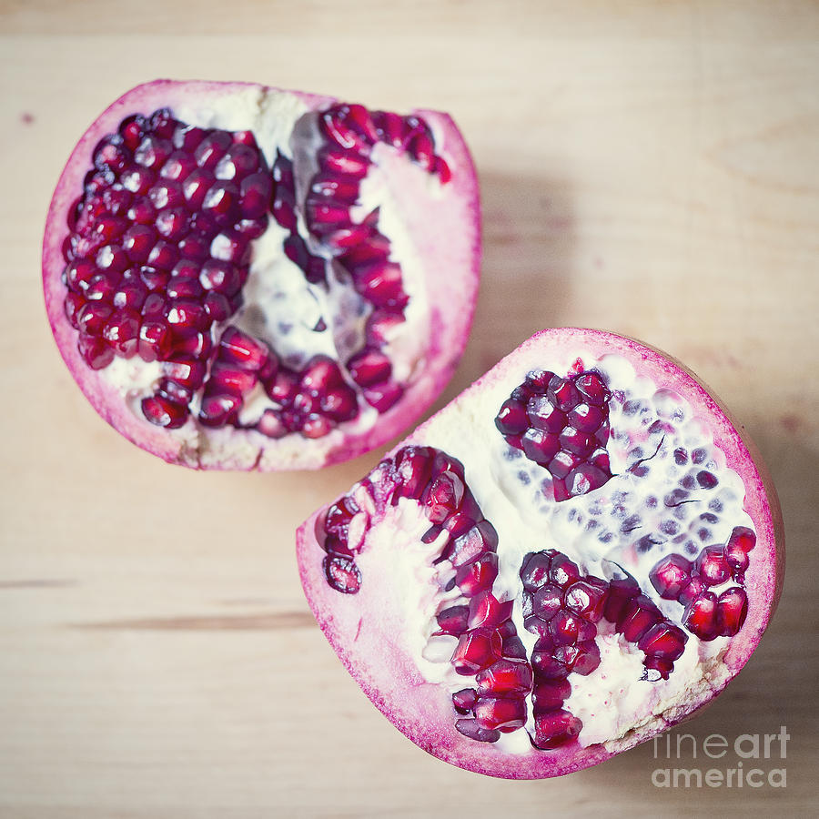 Pomegranate halves Photograph by Ivy Ho