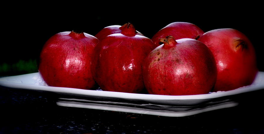 Pomegranates On White Platter Photograph by Tatyana Searcy