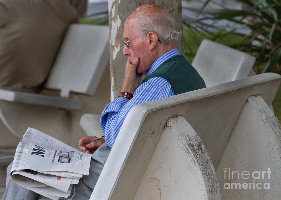 Adult Photograph - Pondering the paper Maiori Italy by Dan Hartford