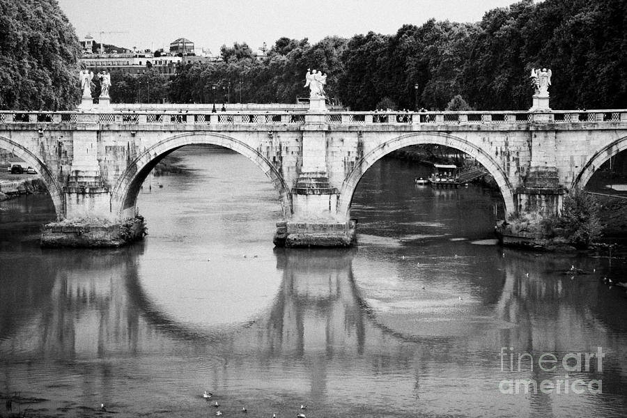 City Photograph - Ponte Sant Angelo over the river tiber and its reflection in Rome Lazio Italy by Joe Fox