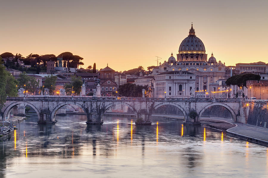 Ponte Santangelo And St Peters Basilica Photograph by Julian Elliott Photography