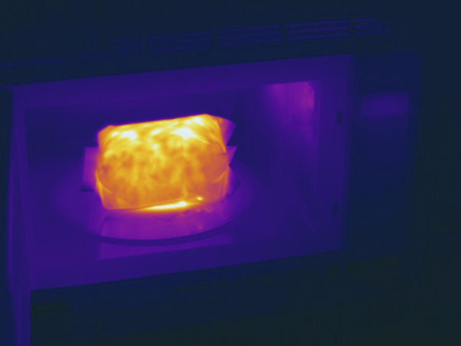 Popcorn Popping In Microwave, Thermogram Photograph by Science Stock Photography