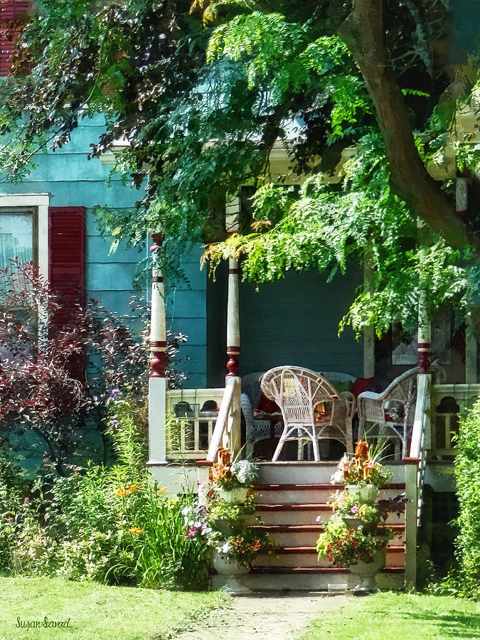 Porch With Flowerpots and Wicker Chairs Photograph by Susan Savad