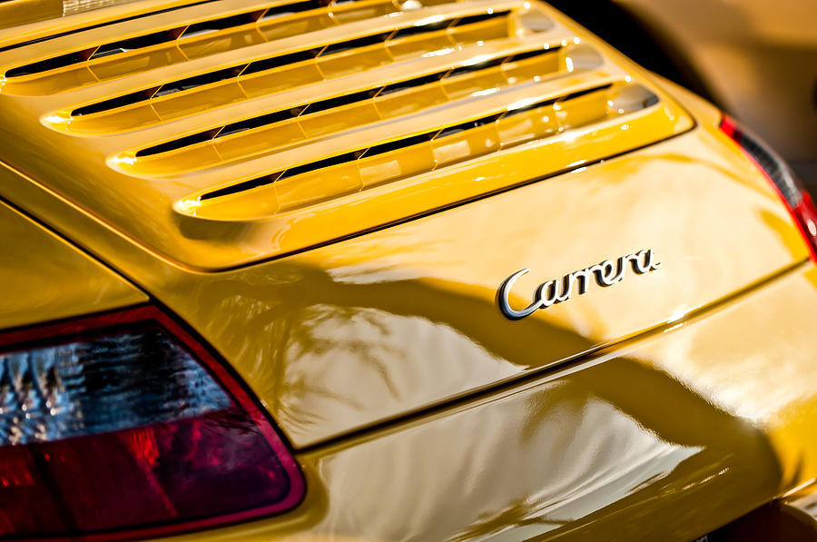 Transportation Photograph - Porsche Carrera Taillight Emblem -0568c by Jill Reger