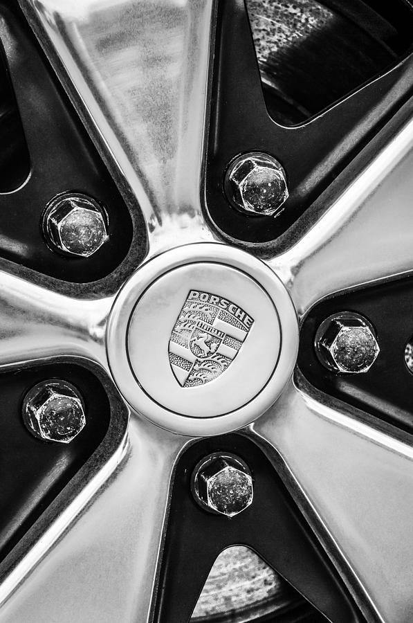 Black And White Photograph - Porsche Wheel Emblem -0660bw by Jill Reger