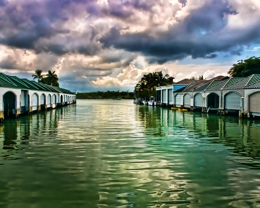Storm Clouds Over  Port Royal Boathouses in Naples Photograph by Ginger Wakem