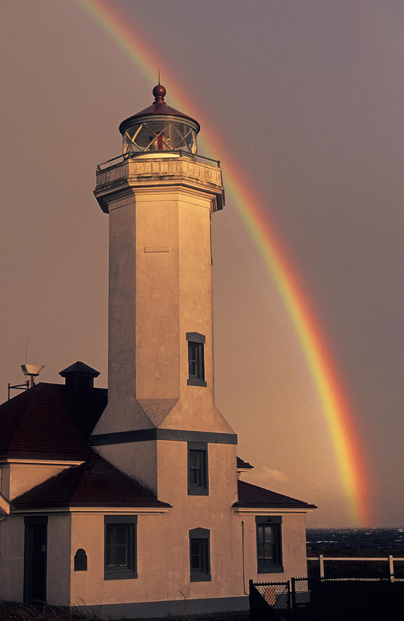Port Townsend Lighthouse with Rainbow Photograph by Cliff Wassmann