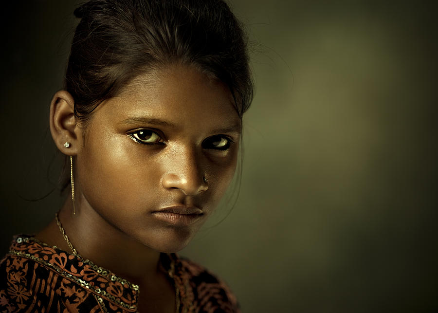 Portrait of a beautiful Indian young woman looking at camera Photograph by Gawrav