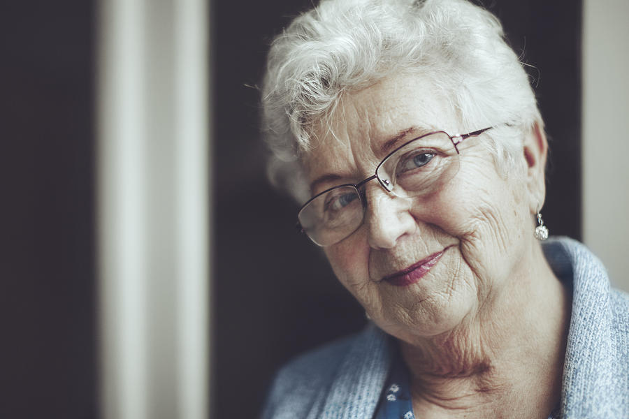 Portrait of a beautiful smiling senior woman Photograph by Eva-Katalin