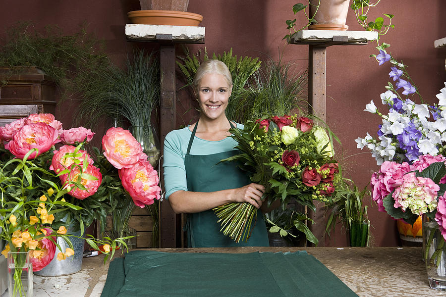 Portrait of a florist Photograph by Hudzilla