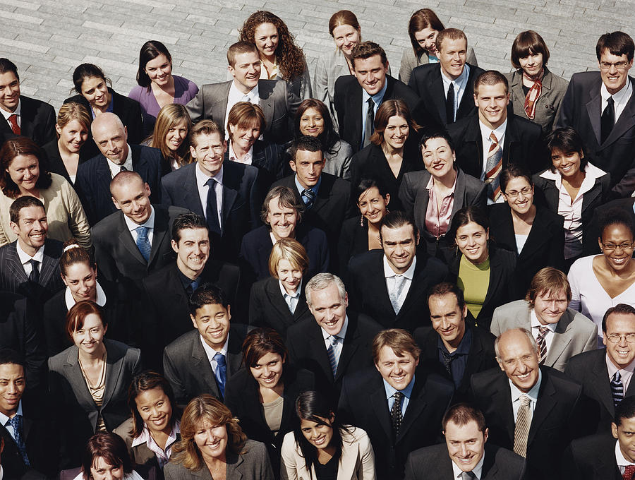 Portrait of a large Group of Business People Standing Outdoors Photograph by Digital Vision.