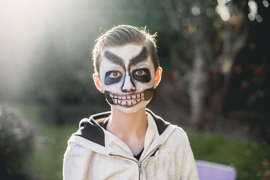 Portrait of a little boy with skeleton make up for halloween Photograph by Carol Yepes