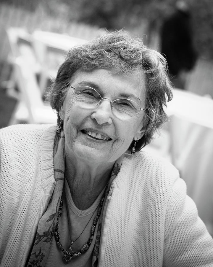 Portrait Of A Mature Woman Photograph by Ron Koeberer