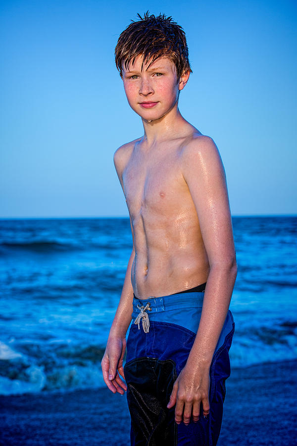 Portrait of a redhead boy standing on beach Photograph by Dfmjr1