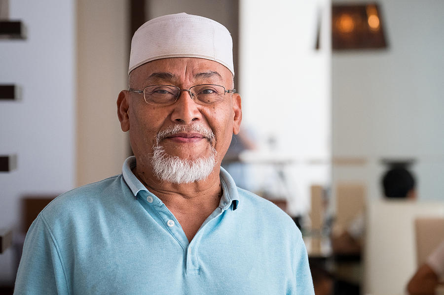 Portrait of a senior malaysian man Photograph by Nattrass