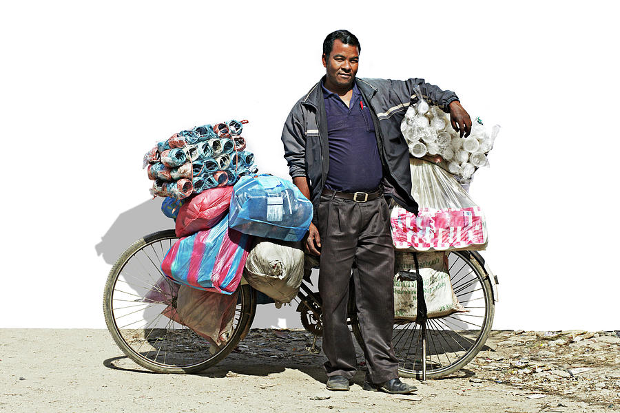 Portrait Of A Vendor Selling Plastic Photograph by Paper Boat Creative