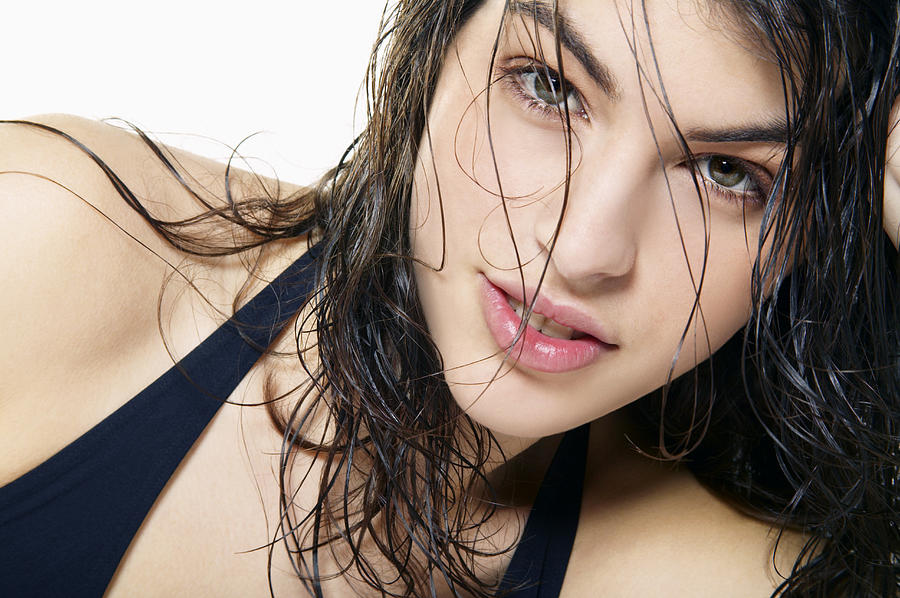 Portrait of a Young Sensual Woman with Wet and Tousled Hair Photograph by Digital Vision.