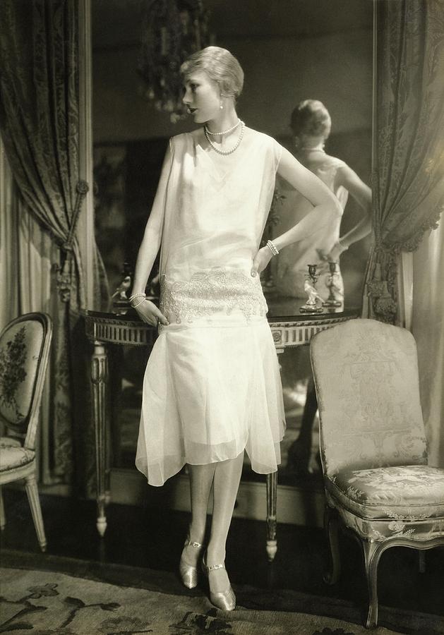 Portrait Photograph - Portrait Of Alden Gay Wearing A Cheruit Dress by Charles Sheeler