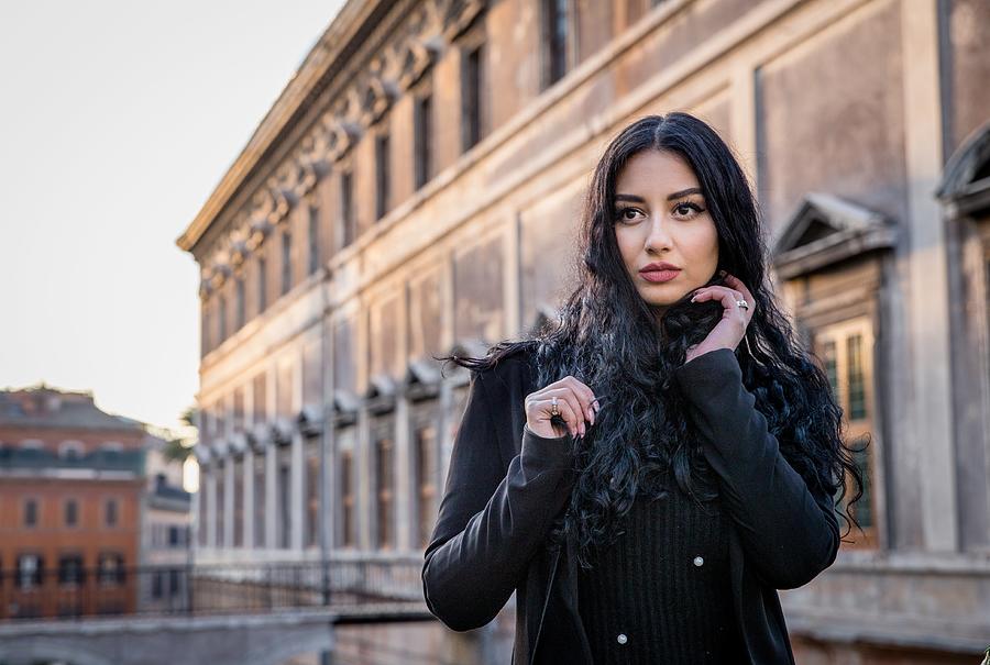 Portrait Of Beautiful Young Woman Standing Against Building Photograph by Kate Passileggeri / EyeEm Portrait Of Beautiful Young Woman Standing Against Building Photograph by Kate Passileggeri / EyeEm