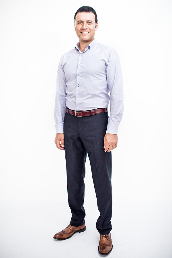 Portrait Of Businessman Smiling While Standing Against White Background Photograph by Aleksandr Grigorev / EyeEm Portrait Of Businessman Smiling While Standing Against White Background Photograph by Aleksandr Grigorev / EyeEm