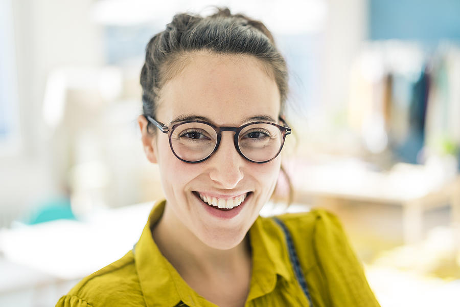 Portrait of happy young woman wearing glasses Photograph by Westend61