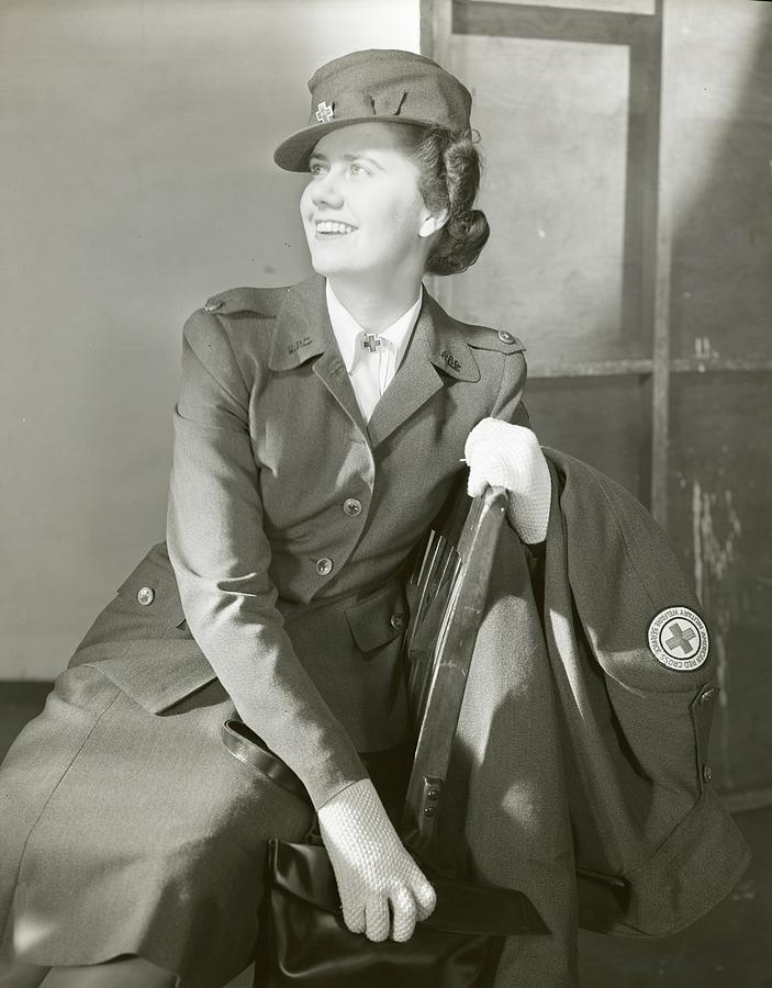 Portrait Of Katherine Blake In Her Red Cross Photograph by Horst P. Horst
