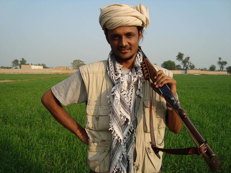 Portrait of man in local turban Photograph by Raja Islam