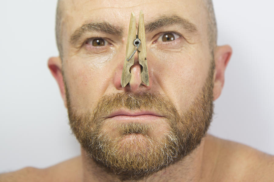 Portrait of man with clothespin on his nose Photograph by Fernando Trabanco Fotografía