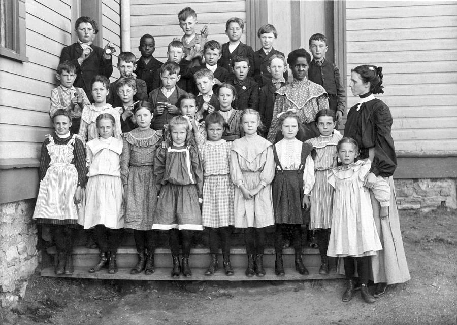 Black And White Photograph - Portrait Of School Children by Underwood Archives