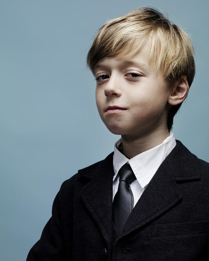Portrait of smartly dressed young boy Photograph by Henrik Sorensen