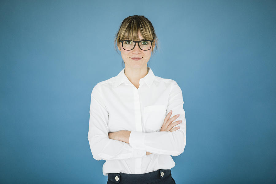 Portrait of smiling businesswoman with glasses Photograph by Westend61