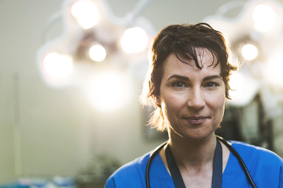 Portrait of smiling female doctor in hospital Photograph by Stígur Már Karlsson /Heimsmyndir